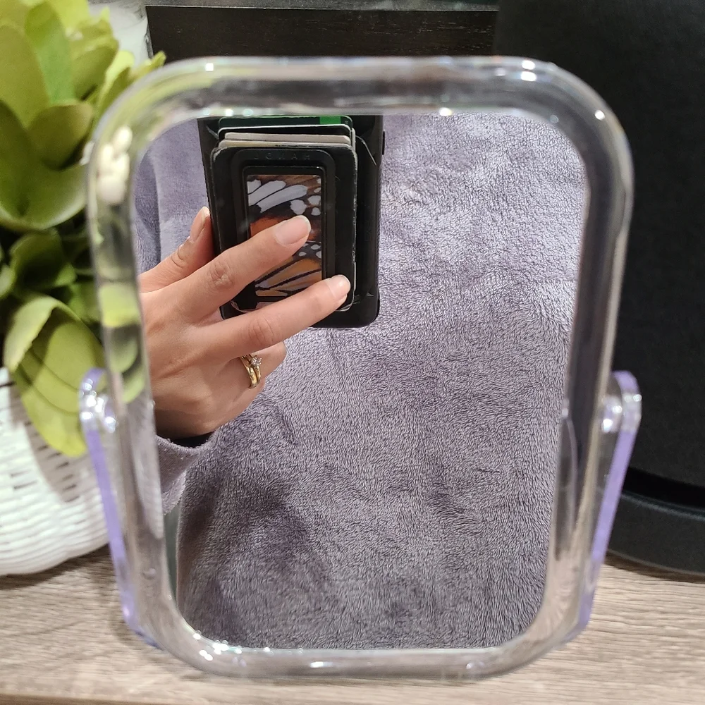 Rectangular vanity mirror with clear frame